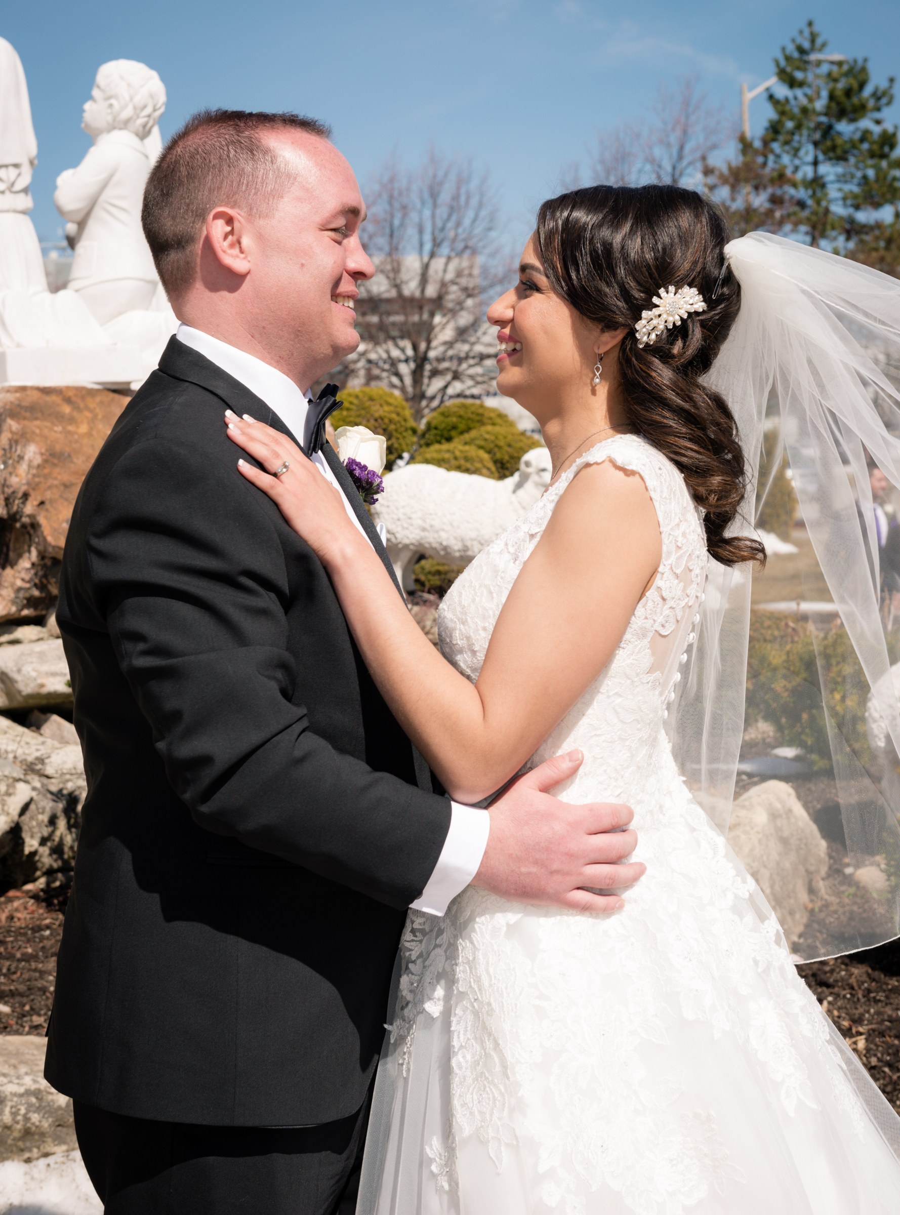 Couple smiling together during outdoor portraits