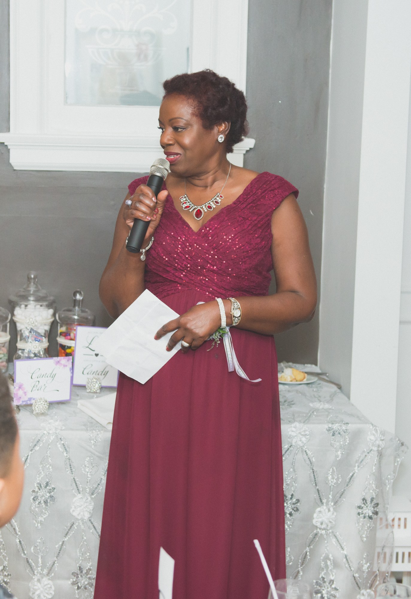 A guest making a speech at the wedding reception